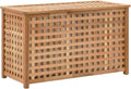 Le coffre a linge en bois massif en coloris orange et beige